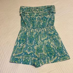 White, blue, green and yellow snack print romper